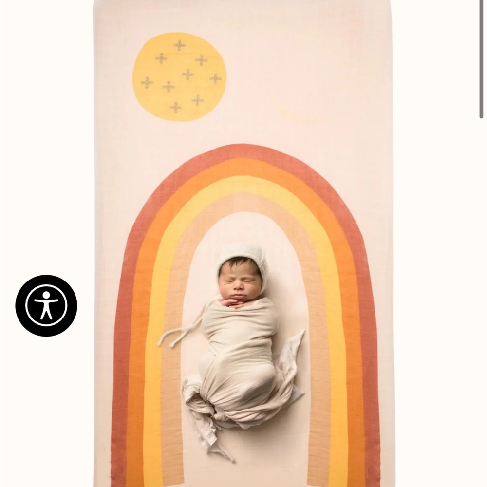 Covered Things rainbow organic crib sheet